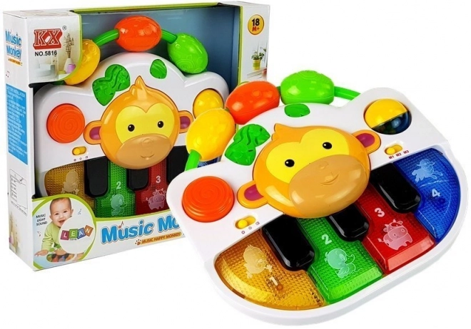 Giocattolo pianola con scimmietta per neonati