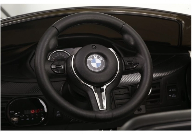 Auto elettrica BMW X6 nero verniciato