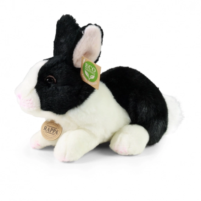 Coniglio peluche bianco e nero sdraiato eco-friendly