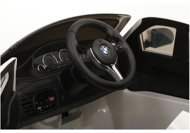 Auto elettrica BMW X6 nero verniciato