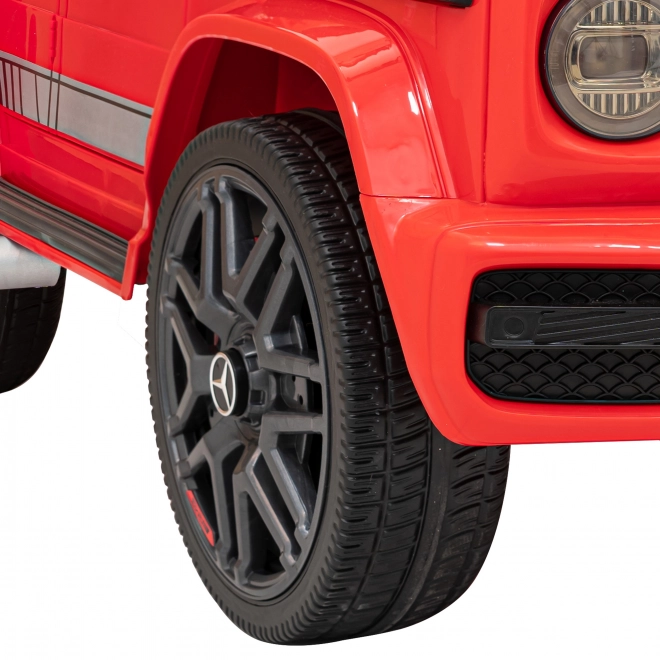 Mercedes AMG G63 per bambini Rosso + telecomando + MP3 LED + avvio lento + EVA + cinture