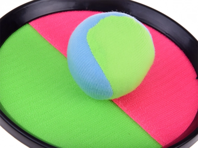 Gioco con racchette e palline di velcro