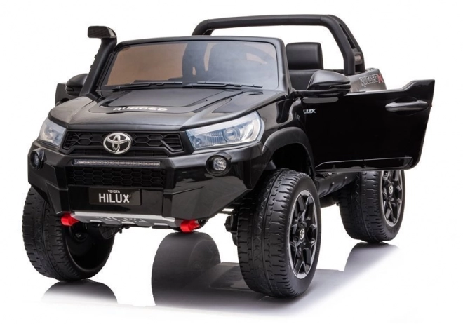 Auto elettrico per bambini Toyota Hilux bianco – Nera