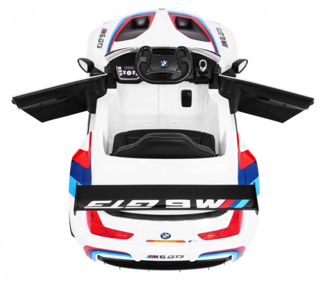 BMW M6 GT3 Auto a batteria per bambini Bianco + ventilazione + suoni MP3 Luci + telecomando