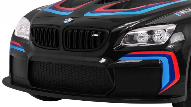 BMW M6 GT3 Auto a batteria per bambini nero + ventilazione + suoni MP3 Luci + telecomando