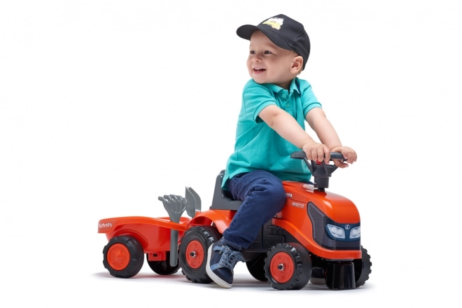 Trattore a pedali per bambini Kubota con rimorchio e accessori