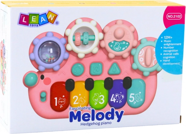 Pianoforte interattivo rosa per bambini con ingranaggi