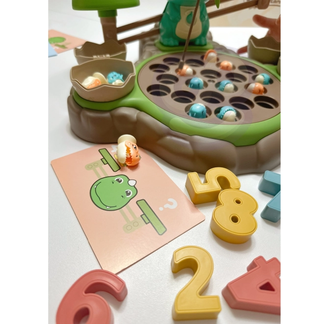 Gioco educativo Dinozaur con bilancia e cattura di WOOPIE