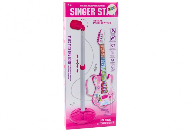 Set chitarra elettrica con supporto e microfono rosa