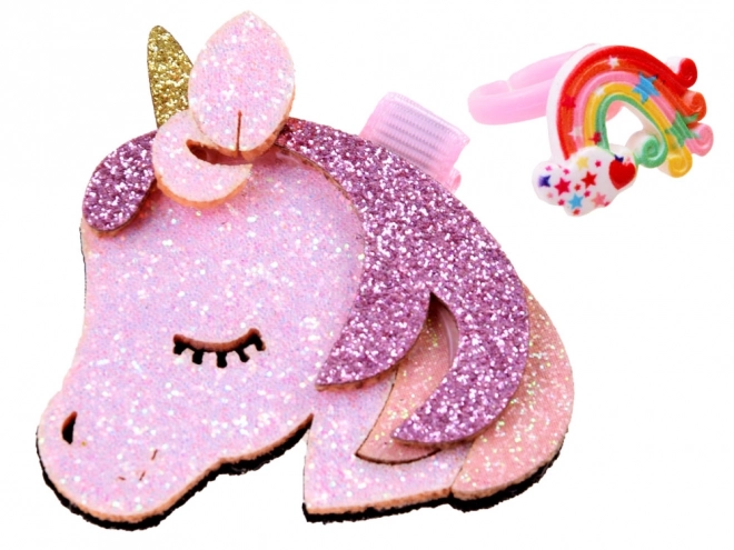 Delizioso cerchietto glitterato con pony e fiocco