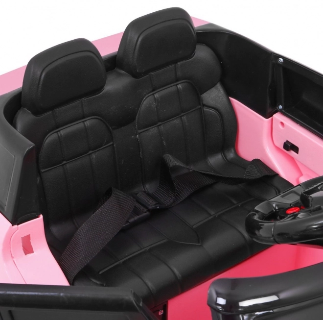 Auto elettrica per bambini rosa con radiocomando e funzioni di sicurezza