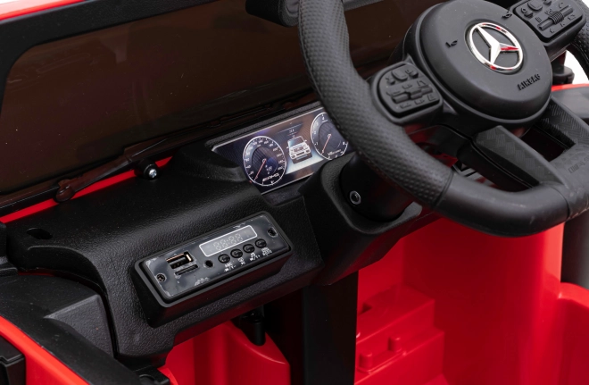 Mercedes AMG G63 per bambini Rosso + telecomando + MP3 LED + avvio lento + EVA + cinture