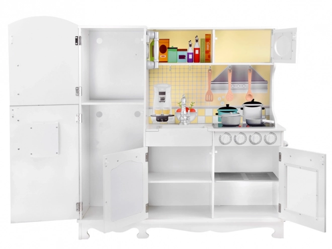 Grande cucina in legno con frigorifero e forno