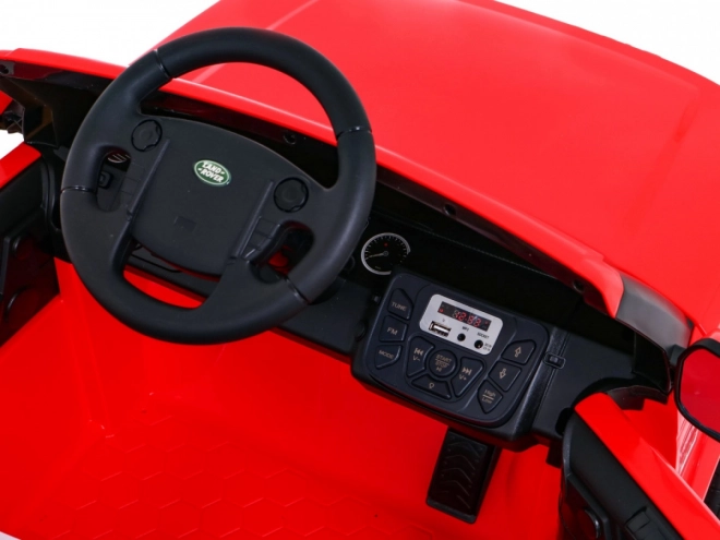 Land Rover Discovery Macchinina elettrica per bambini rossa + telecomando + ruote in EVA + avvio lento + radio MP3