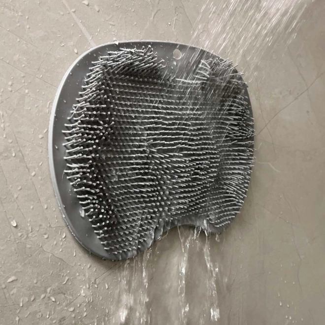Spazzola massaggiante in silicone per doccia con ventose grigio