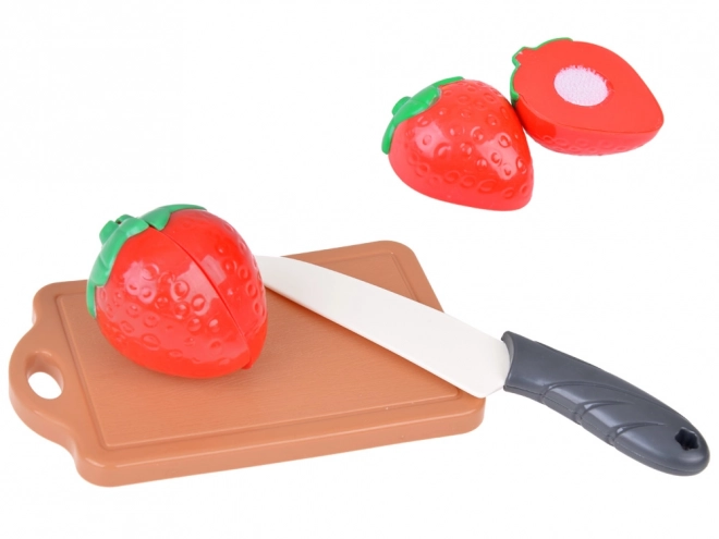 Set di frutta in plastica da tagliare con tagliere e coltello