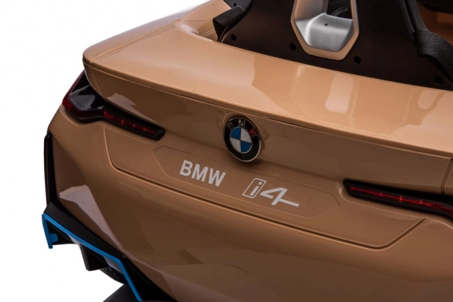 Auto a batteria BMW I4 dorato 4x4
