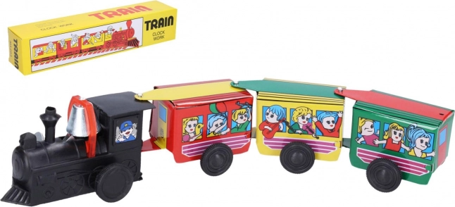 Trenino in metallo a carica con chiavetta 28 cm