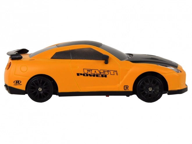 Auto sportiva telecomandata R/C 1:24 a ruote intercambiabili – Giallo