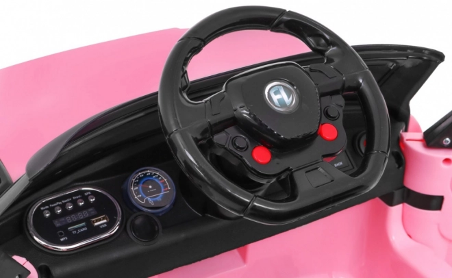 Auto elettrica per bambini rosa con radiocomando e funzioni di sicurezza