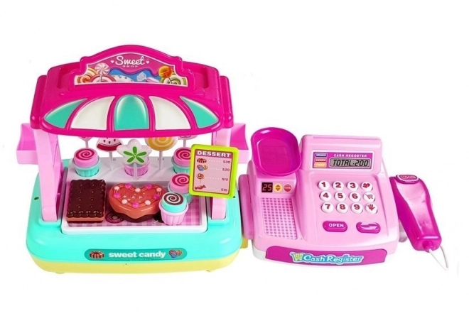 Cassa del registratore di cassa per bambini con stand di dolciumi