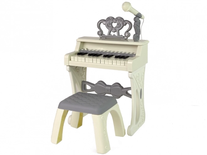 Pianola elettrica turchese con sedia e 25 tasti