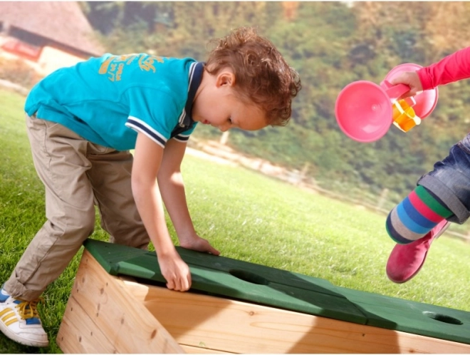 Sandbox in legno AXI con spazio di stivaggio e telone