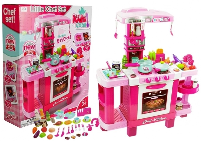 Grande cucina rosa per bambini con tostapane e macchina da caffè