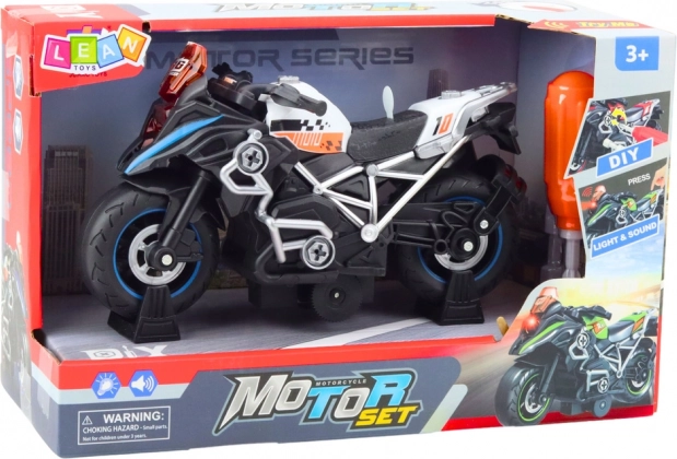 Motocicletta da montare con luci e suoni da corsa nera