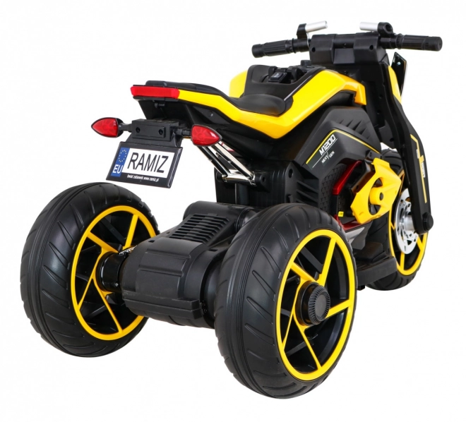 Futura motocicletta per bambini a batteria gialla + Pannello Audio + Avvio lento + Ruote EVA