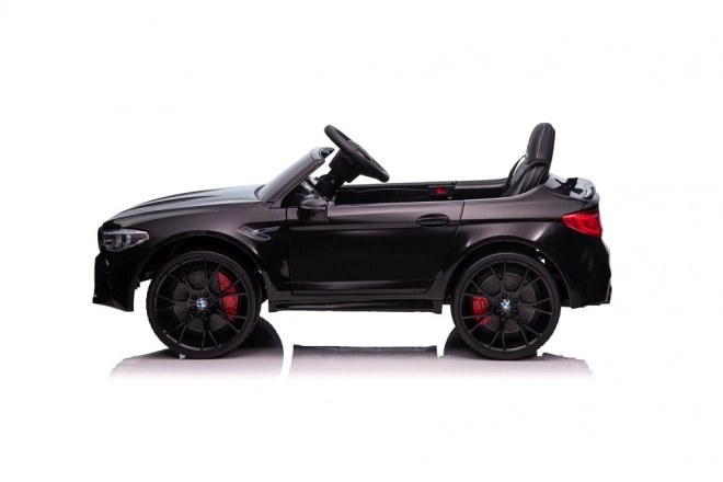 Auto elettrica per bambini BMW M5 nero