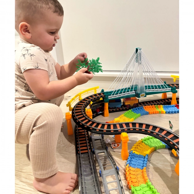 Set pista da corsa e trenino elettrico 2 in 1