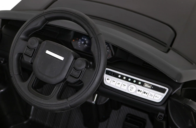 Land Rover Discovery Sport per bambini nero + telecomando + avvio lento + funzione altalena + MP3 LED