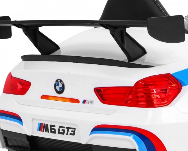 BMW M6 GT3 Auto a batteria per bambini Bianco + ventilazione + suoni MP3 Luci + telecomando