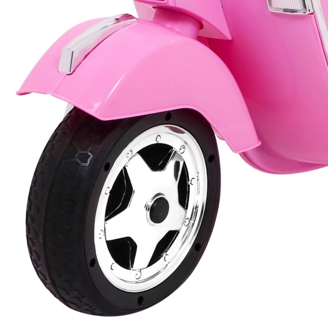 vespa elettrica per bambini rosa con ruote ausiliarie e audio