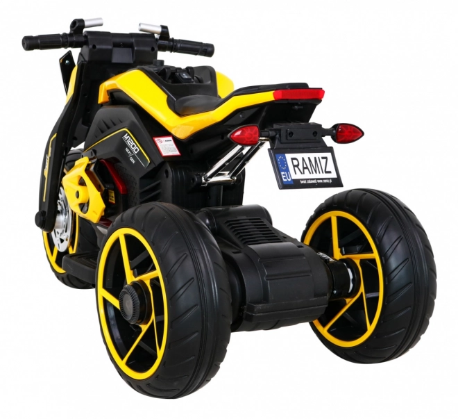 Futura motocicletta per bambini a batteria gialla + Pannello Audio + Avvio lento + Ruote EVA
