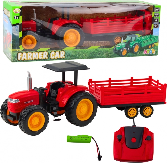 Trattore agricolo telecomandato con rimorchio rosso