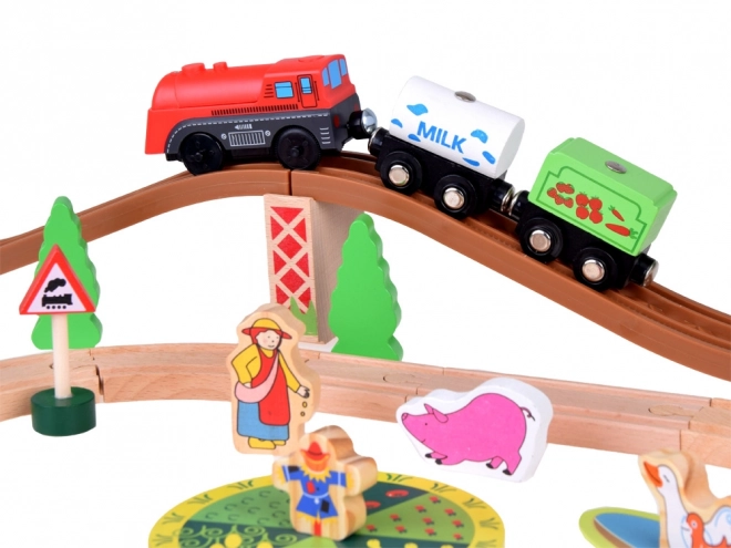 Trenino in legno a batteria con fattoria e figurine