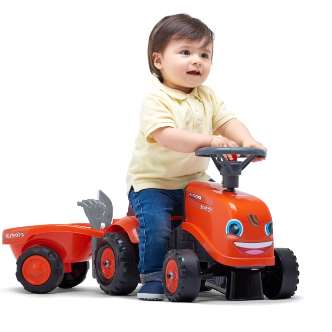 Trattore a pedali per bambini Kubota con rimorchio e accessori