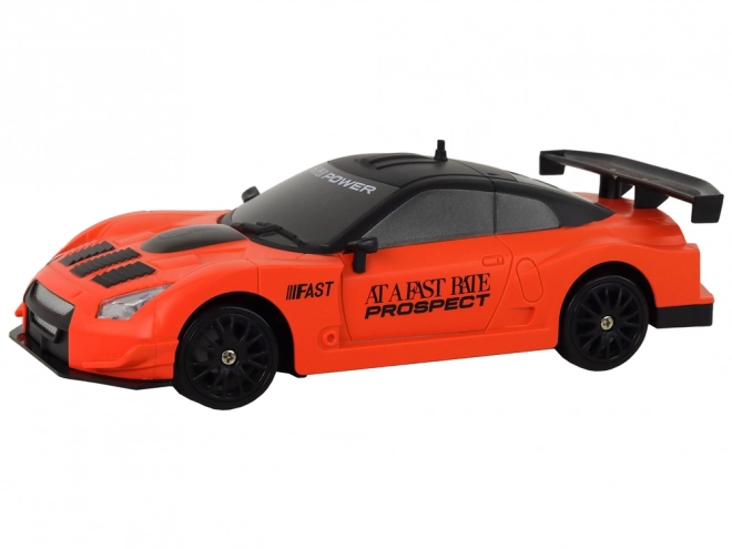 Auto Sportivo Telecomandato RC 1:24 Arancione con Ruote Intercambiabili