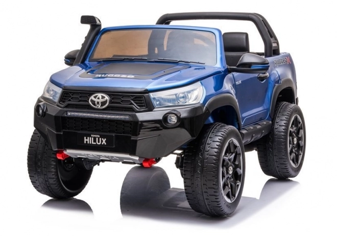 Auto elettrico per bambini Toyota Hilux bianco – Blu