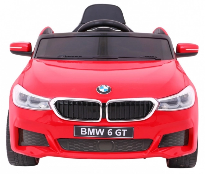 BMW 6 GT Auto a batteria rosso + telecomando + partenza lenta + EVA + cinture + LED MP3