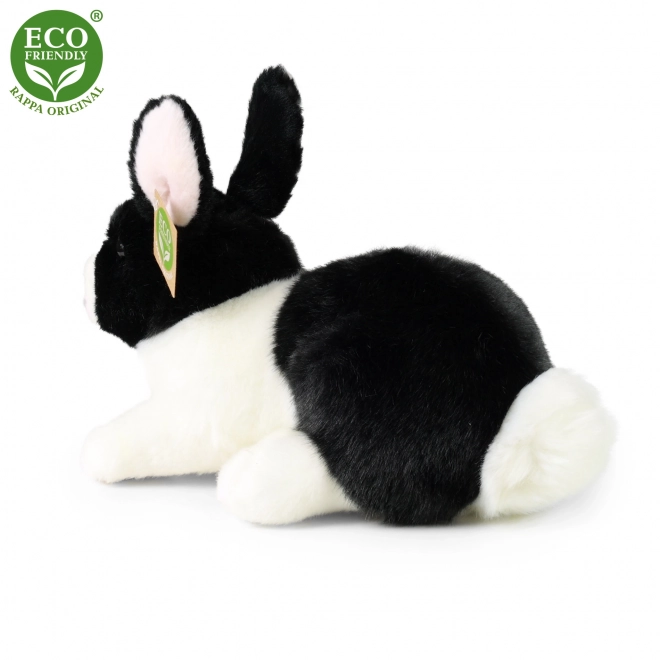 Coniglio peluche bianco e nero sdraiato eco-friendly