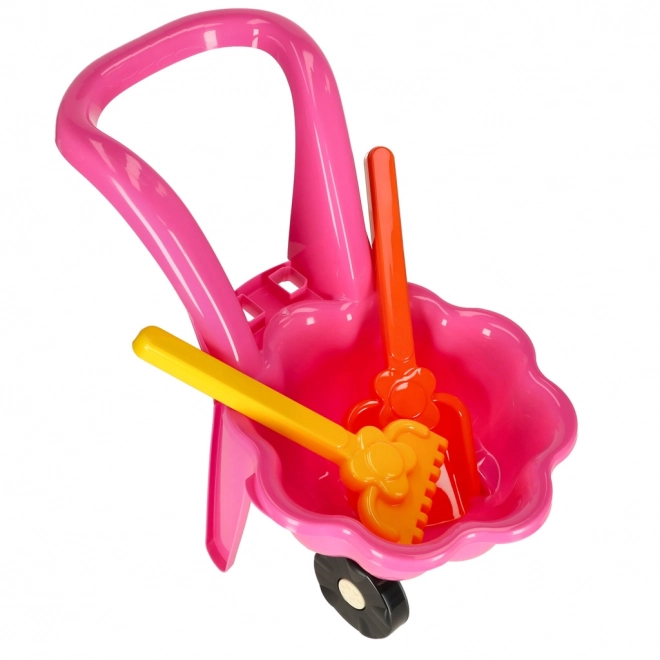 Carriola rosa per bambini con set da giardino margherita