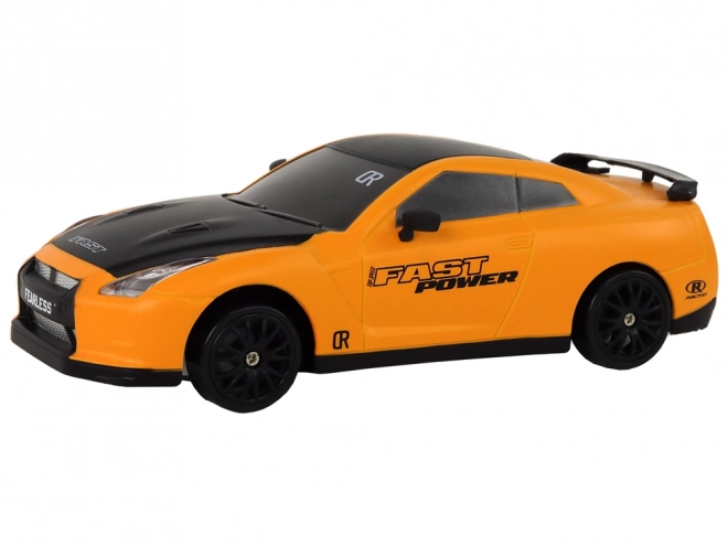 Auto sportiva telecomandata R/C 1:24 a ruote intercambiabili – Giallo