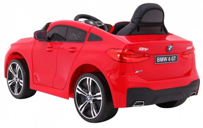 BMW 6 GT Auto a batteria rosso + telecomando + partenza lenta + EVA + cinture + LED MP3
