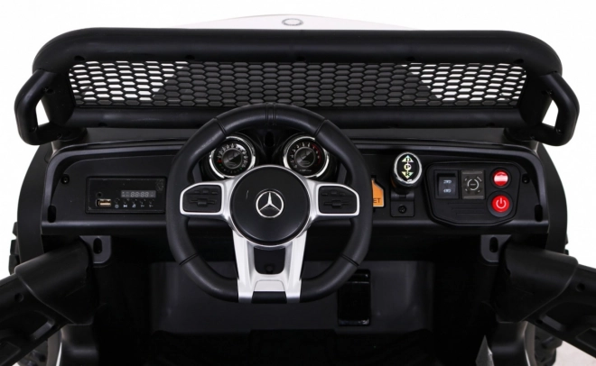 Mercedes Benz Unimog per bambini bianco + trazione 4x4 + telecomando + portabagagli + partenza lenta + MP3 LED
