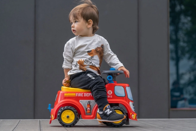 Bicicletta senza pedali dei pompieri per bambini con sedile apribile e clacson