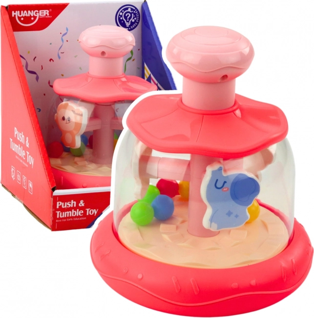 Giostra rosa con palline e animaletti
