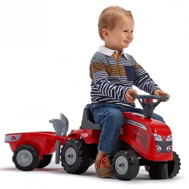 Trattore a spinta Massey Ferguson rosso con volante